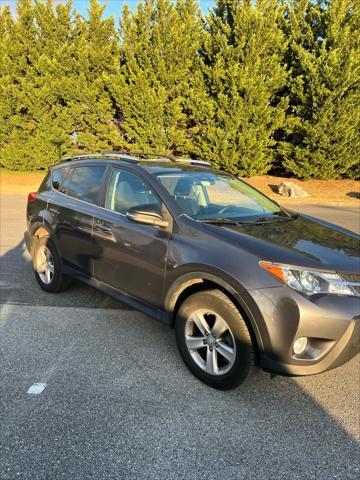 used 2013 Toyota RAV4 car, priced at $13,999