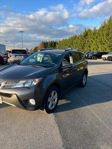 used 2013 Toyota RAV4 car, priced at $13,999