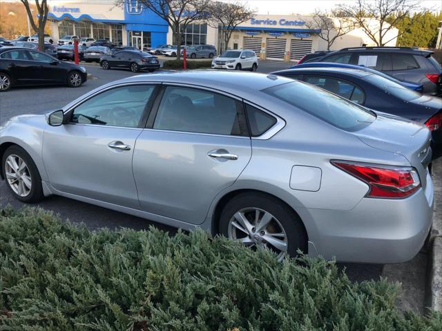 used 2015 Nissan Altima car, priced at $10,999