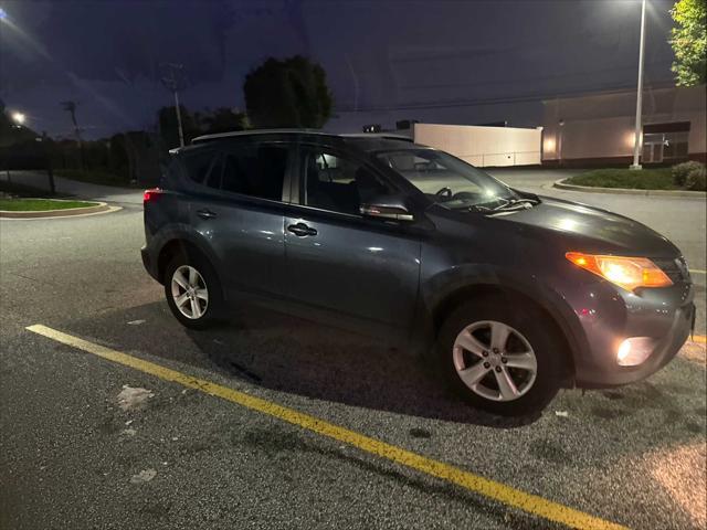 used 2013 Toyota RAV4 car, priced at $14,999