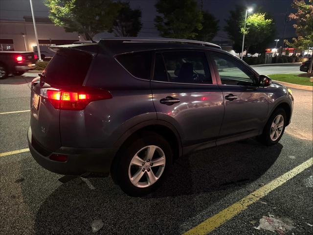 used 2013 Toyota RAV4 car, priced at $14,999