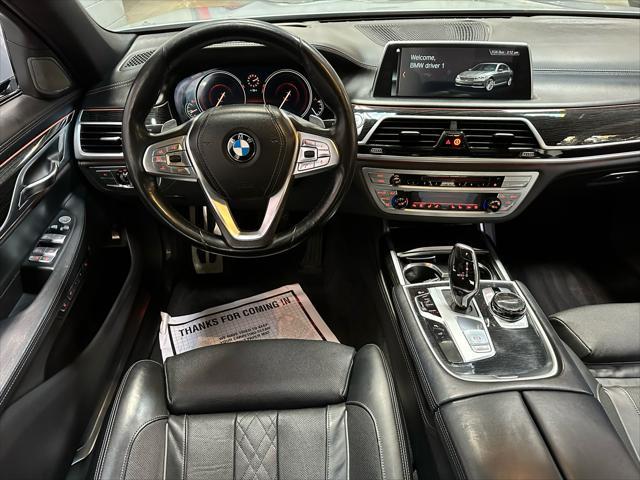 used 2018 BMW 750 car, priced at $27,995