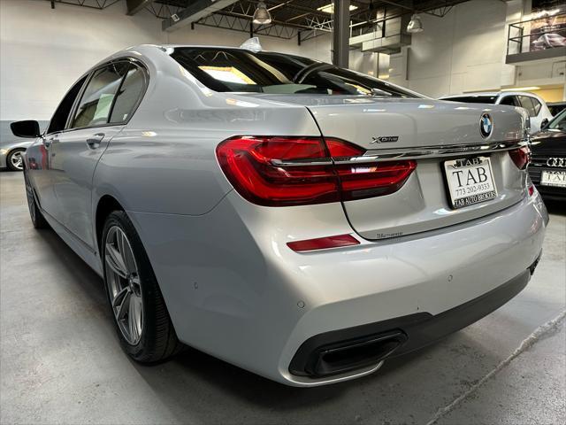 used 2018 BMW 750 car, priced at $27,995