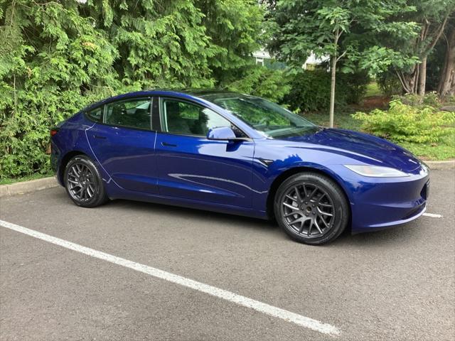 used 2025 Tesla Model 3 car, priced at $34,981
