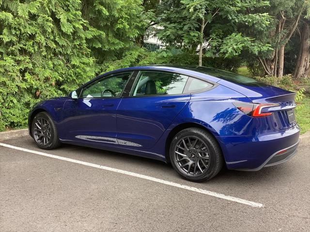 used 2025 Tesla Model 3 car, priced at $34,981