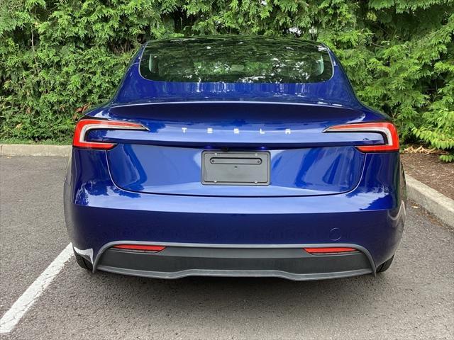 used 2025 Tesla Model 3 car, priced at $34,981