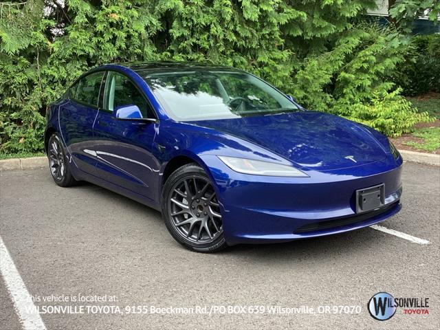 used 2025 Tesla Model 3 car, priced at $34,981
