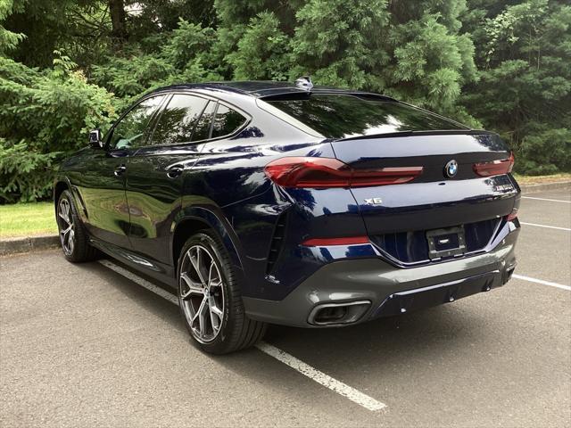 used 2022 BMW X6 car, priced at $53,981