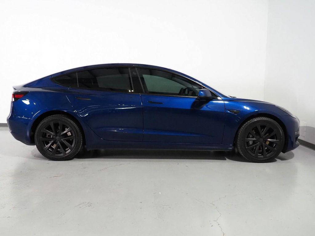 used 2023 Tesla Model 3 car, priced at $27,500