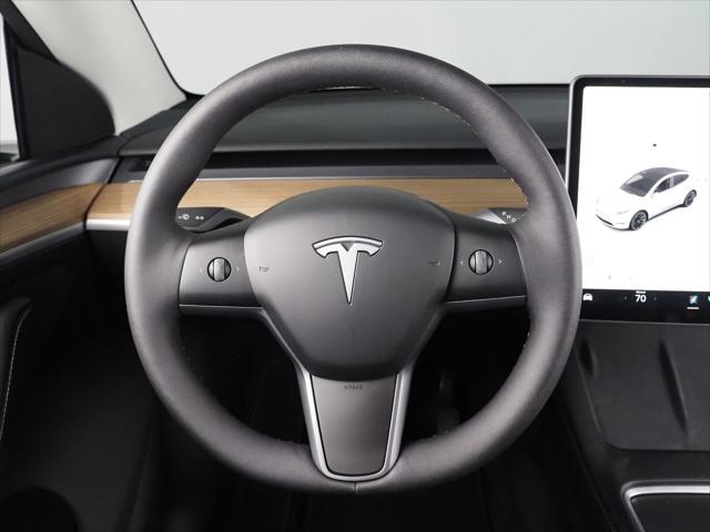 used 2025 Tesla Model Y car, priced at $39,950
