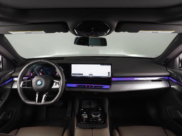 used 2025 BMW i5 car, priced at $61,950