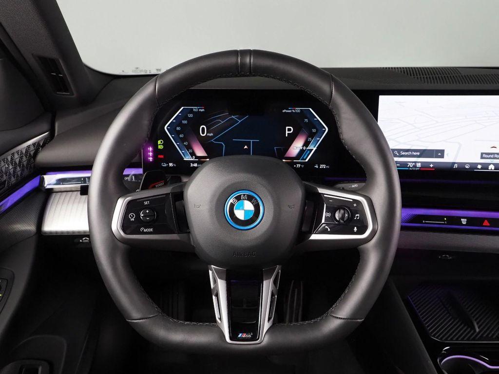 used 2025 BMW i5 car, priced at $55,950