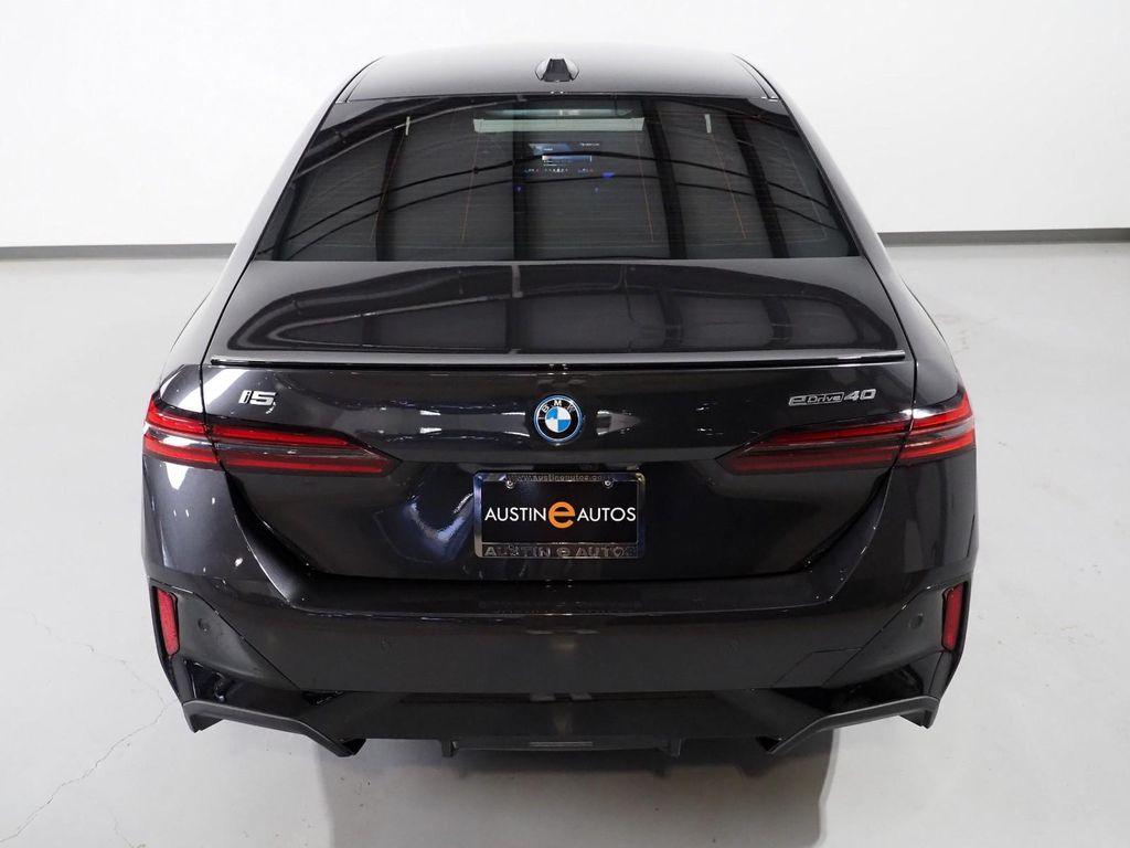 used 2025 BMW i5 car, priced at $55,950