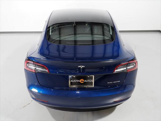 used 2022 Tesla Model 3 car, priced at $27,950