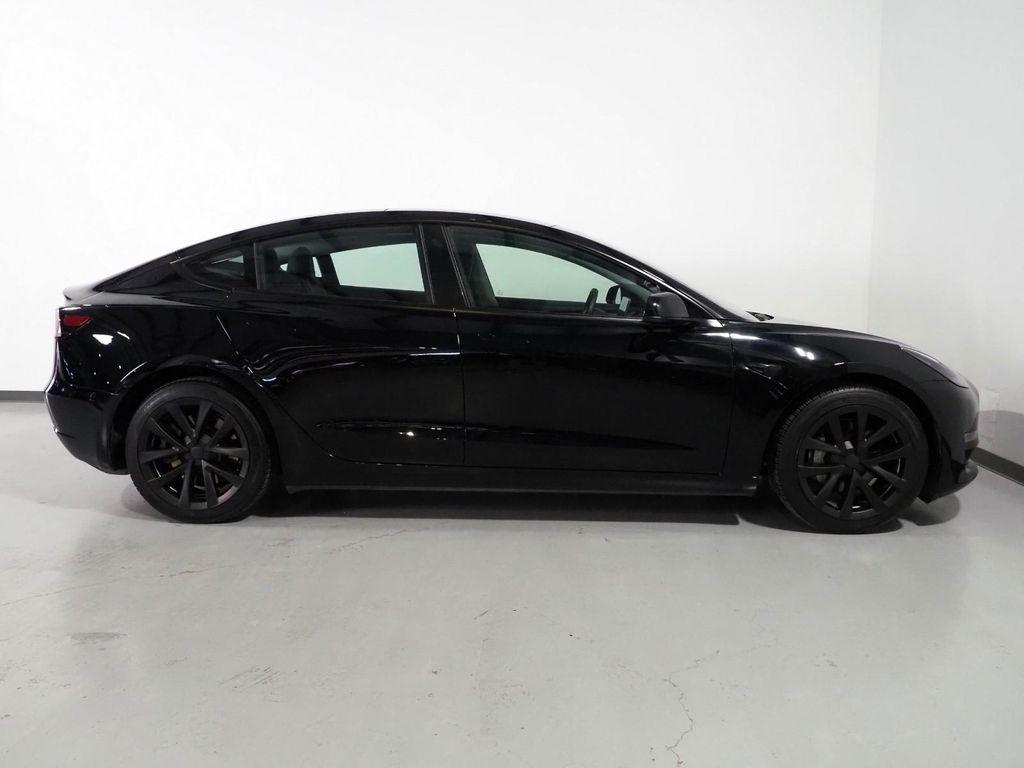 used 2023 Tesla Model 3 car, priced at $27,500