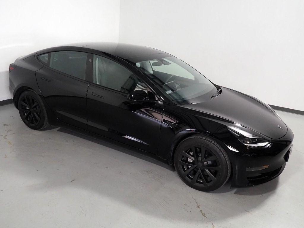 used 2023 Tesla Model 3 car, priced at $27,500