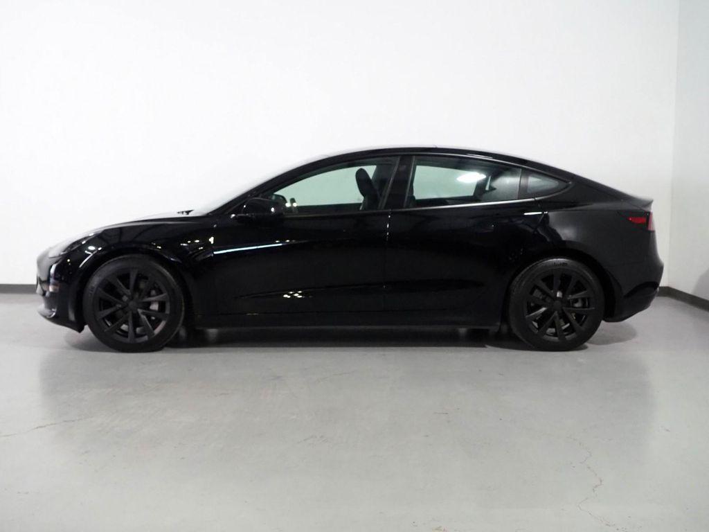 used 2023 Tesla Model 3 car, priced at $27,500