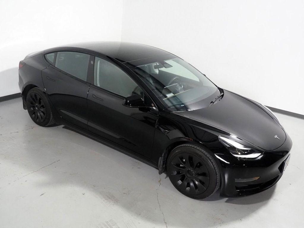 used 2023 Tesla Model 3 car, priced at $27,500