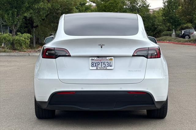 used 2021 Tesla Model Y car, priced at $27,847