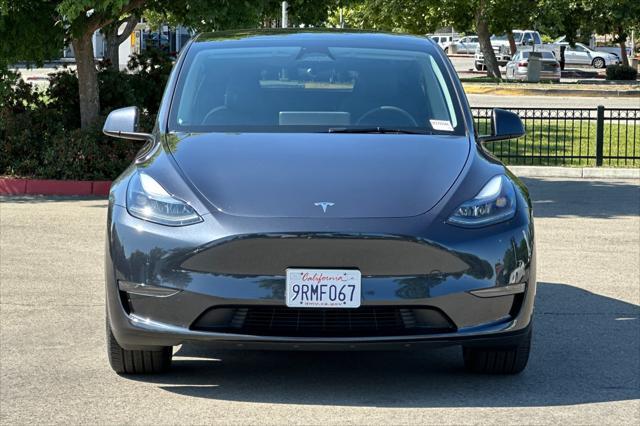 used 2025 Tesla Model Y car, priced at $37,777