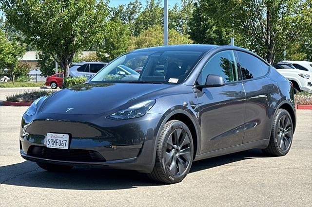 used 2025 Tesla Model Y car, priced at $37,777