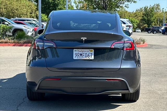 used 2025 Tesla Model Y car, priced at $37,777