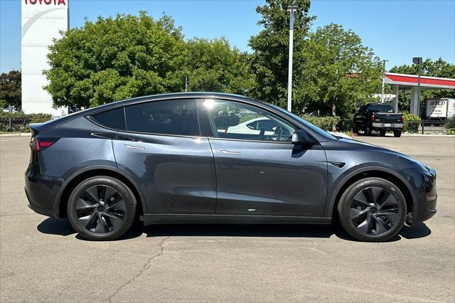 used 2025 Tesla Model Y car, priced at $37,777