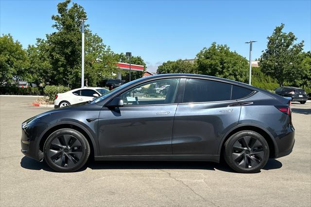 used 2025 Tesla Model Y car, priced at $37,777