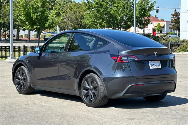 used 2025 Tesla Model Y car, priced at $37,777