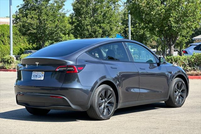 used 2025 Tesla Model Y car, priced at $37,777