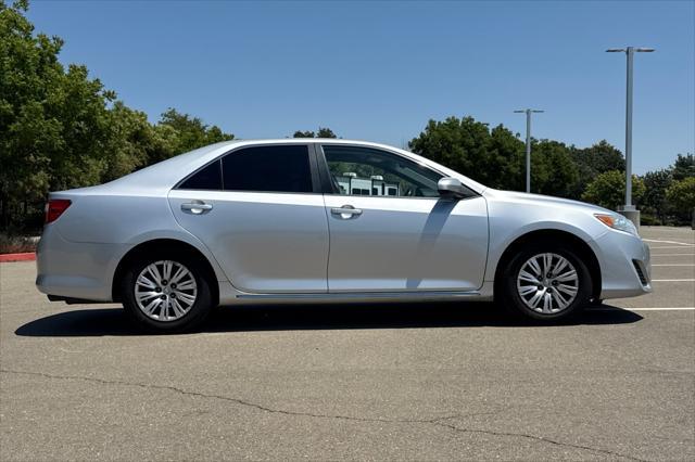 used 2014 Toyota Camry car, priced at $10,312