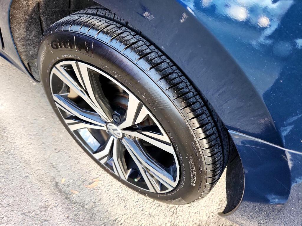 used 2021 Volkswagen Passat car, priced at $19,299
