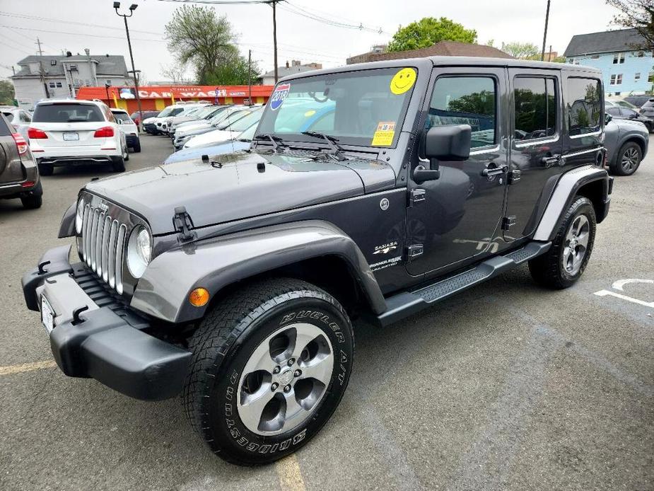 used 2018 Jeep Wrangler JK Unlimited car, priced at $23,999