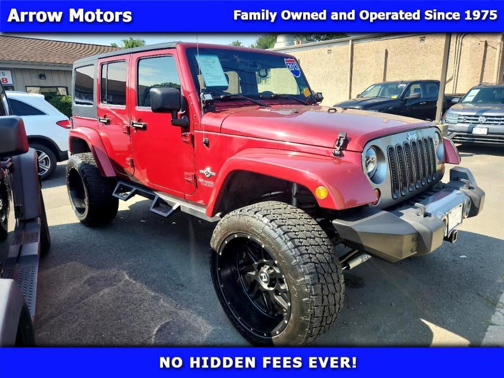 used 2013 Jeep Wrangler Unlimited car, priced at $15,488