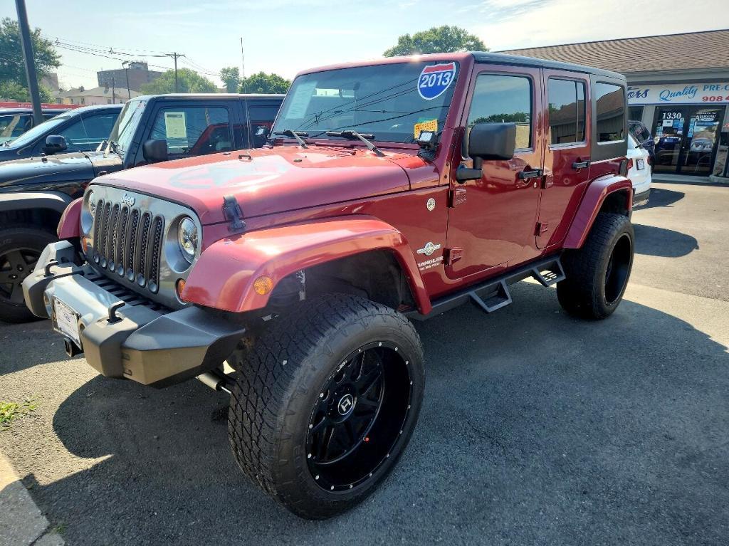 used 2013 Jeep Wrangler Unlimited car, priced at $15,488
