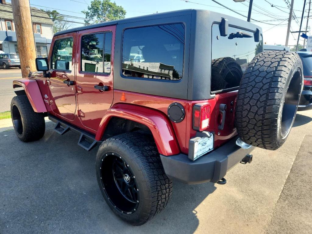 used 2013 Jeep Wrangler Unlimited car, priced at $15,488