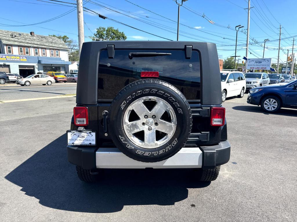 used 2010 Jeep Wrangler Unlimited car, priced at $11,488