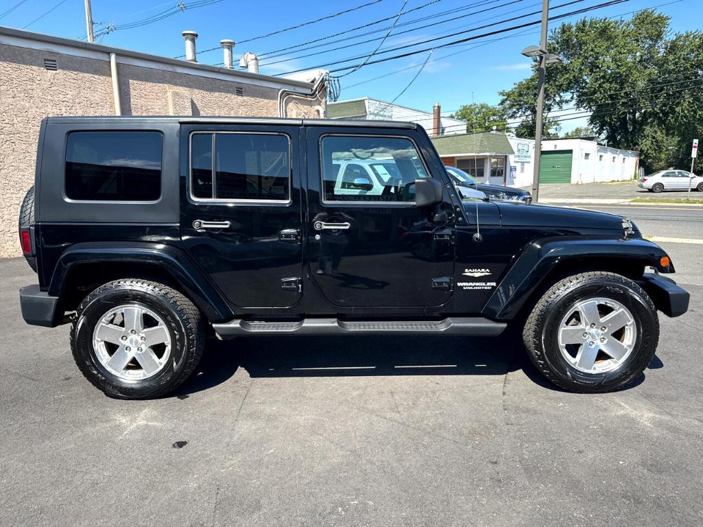 used 2010 Jeep Wrangler Unlimited car, priced at $11,488