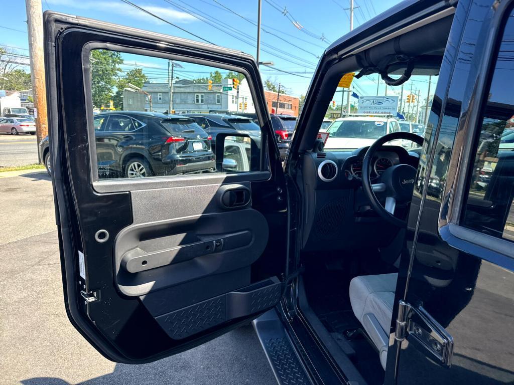 used 2010 Jeep Wrangler Unlimited car, priced at $11,488