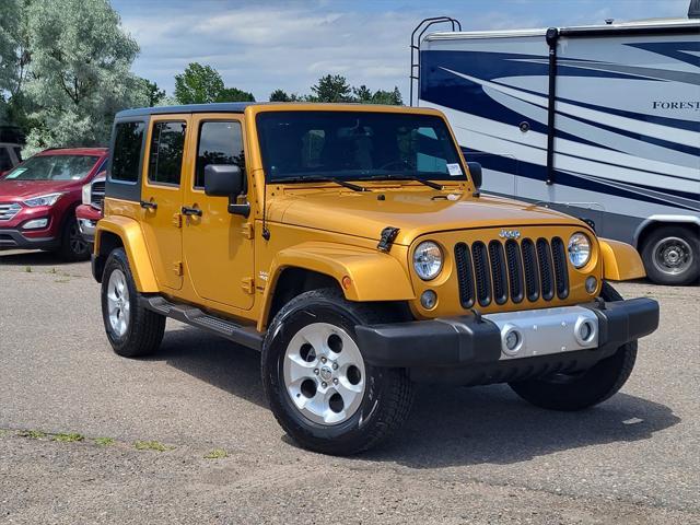 used 2014 Jeep Wrangler Unlimited car, priced at $16,898