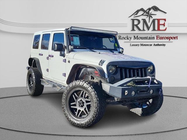 used 2015 Jeep Wrangler Unlimited car, priced at $21,698