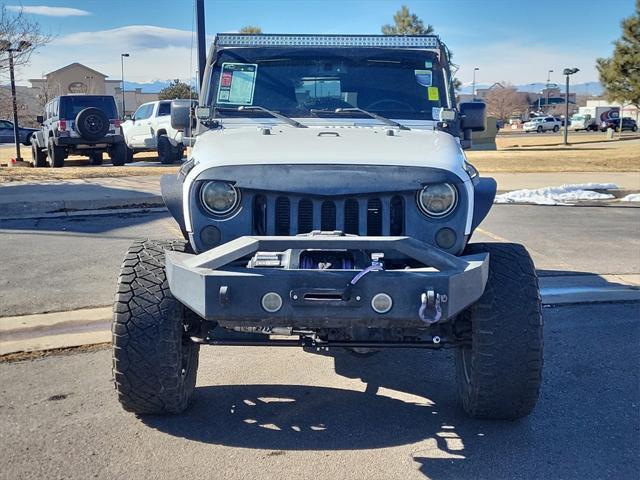 used 2015 Jeep Wrangler Unlimited car, priced at $19,998
