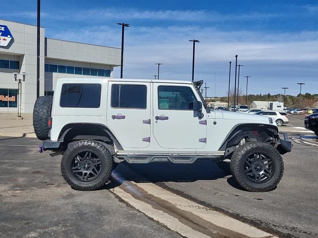 used 2015 Jeep Wrangler Unlimited car, priced at $19,998