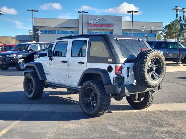 used 2015 Jeep Wrangler Unlimited car, priced at $25,599