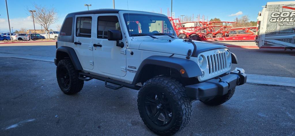 used 2015 Jeep Wrangler Unlimited car, priced at $25,599