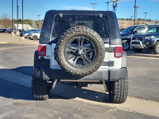 used 2015 Jeep Wrangler Unlimited car, priced at $25,599