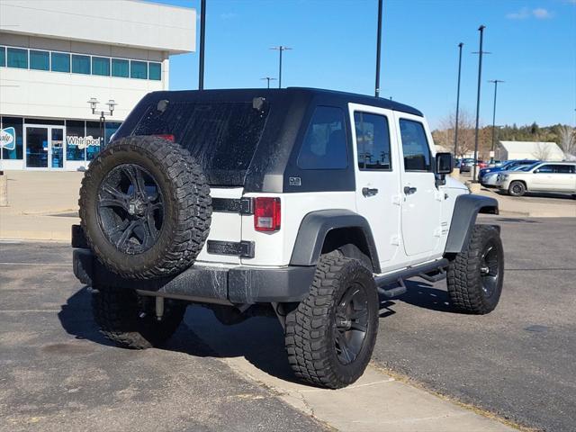 used 2015 Jeep Wrangler Unlimited car, priced at $25,599