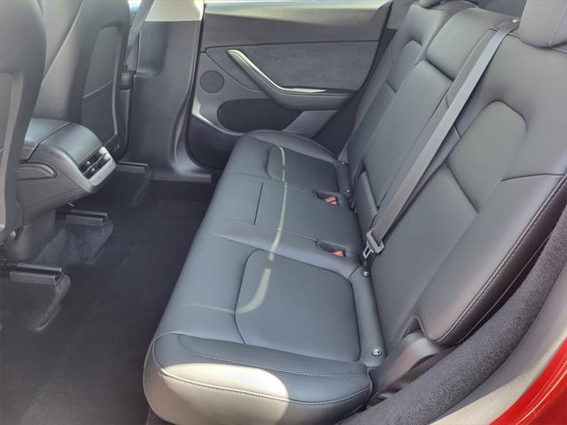used 2024 Tesla Model Y car, priced at $34,998