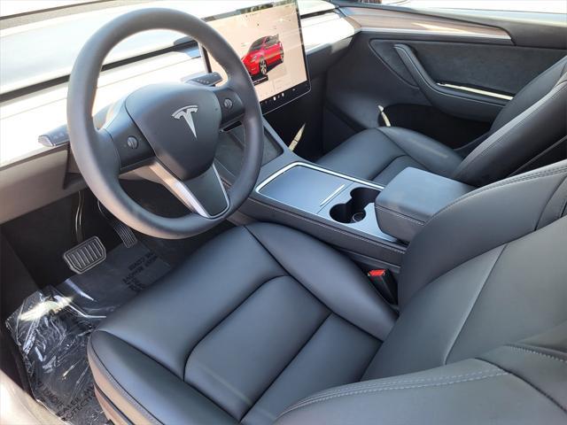 used 2024 Tesla Model Y car, priced at $34,998