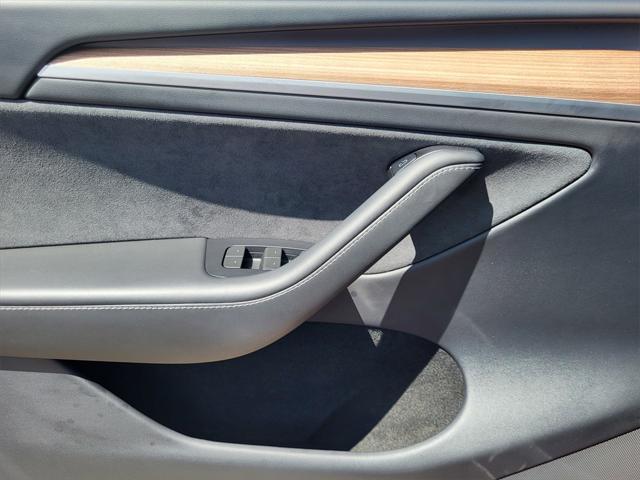 used 2024 Tesla Model Y car, priced at $34,998